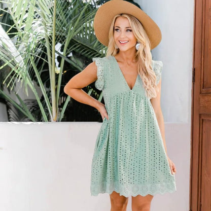 Nina | Broderad klänning med shorts och fickor